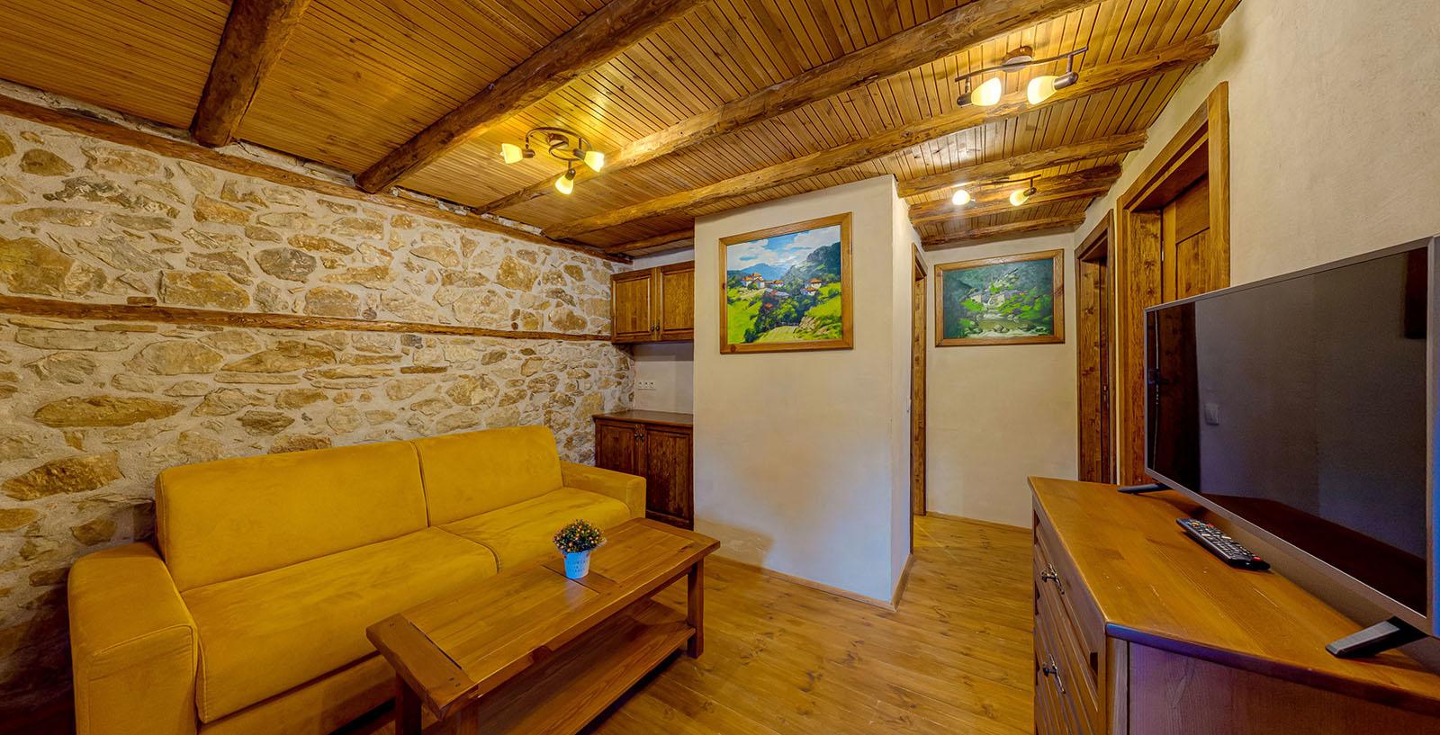 Stone and wood details in the guest house