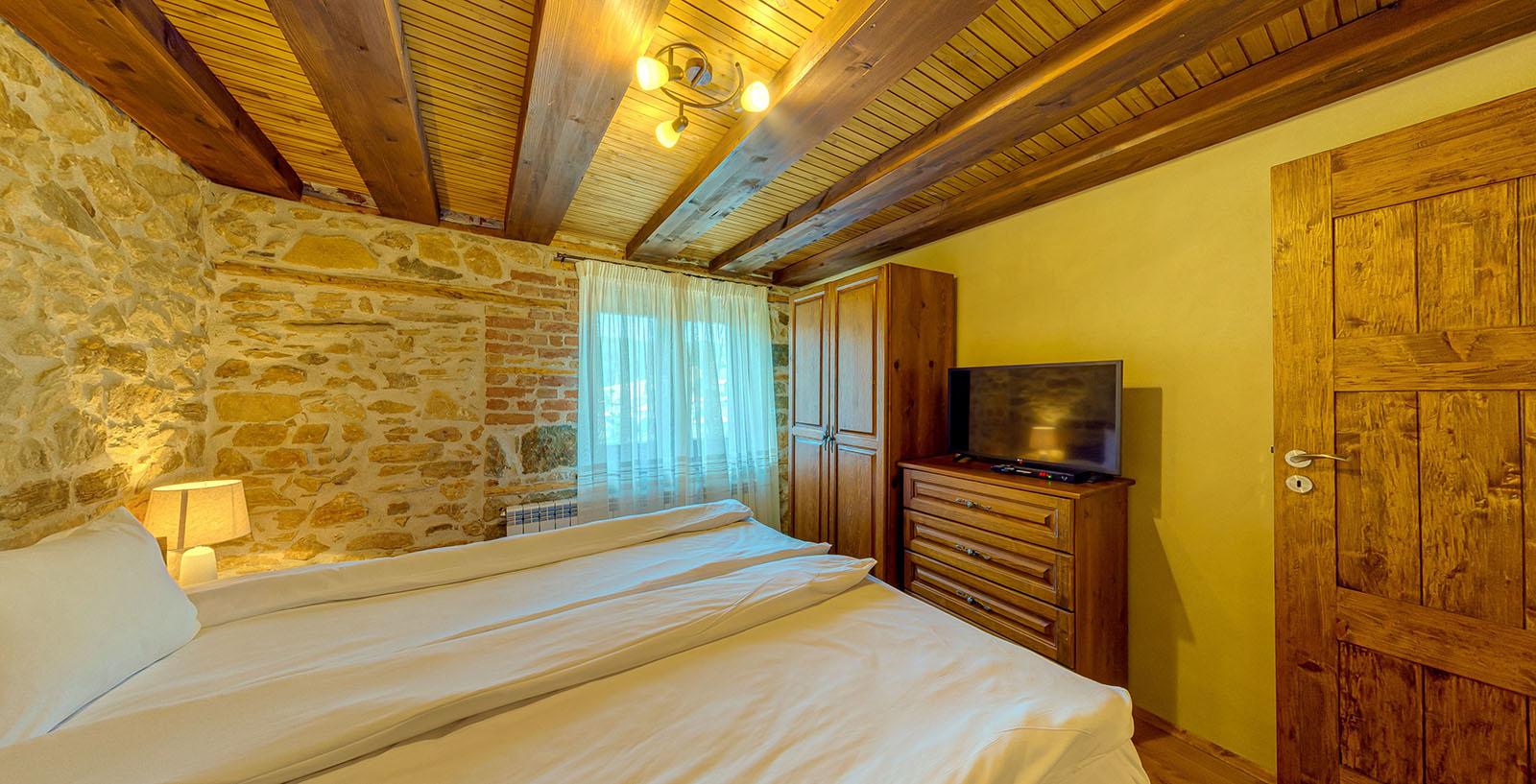 Stone and wood details in the guest house