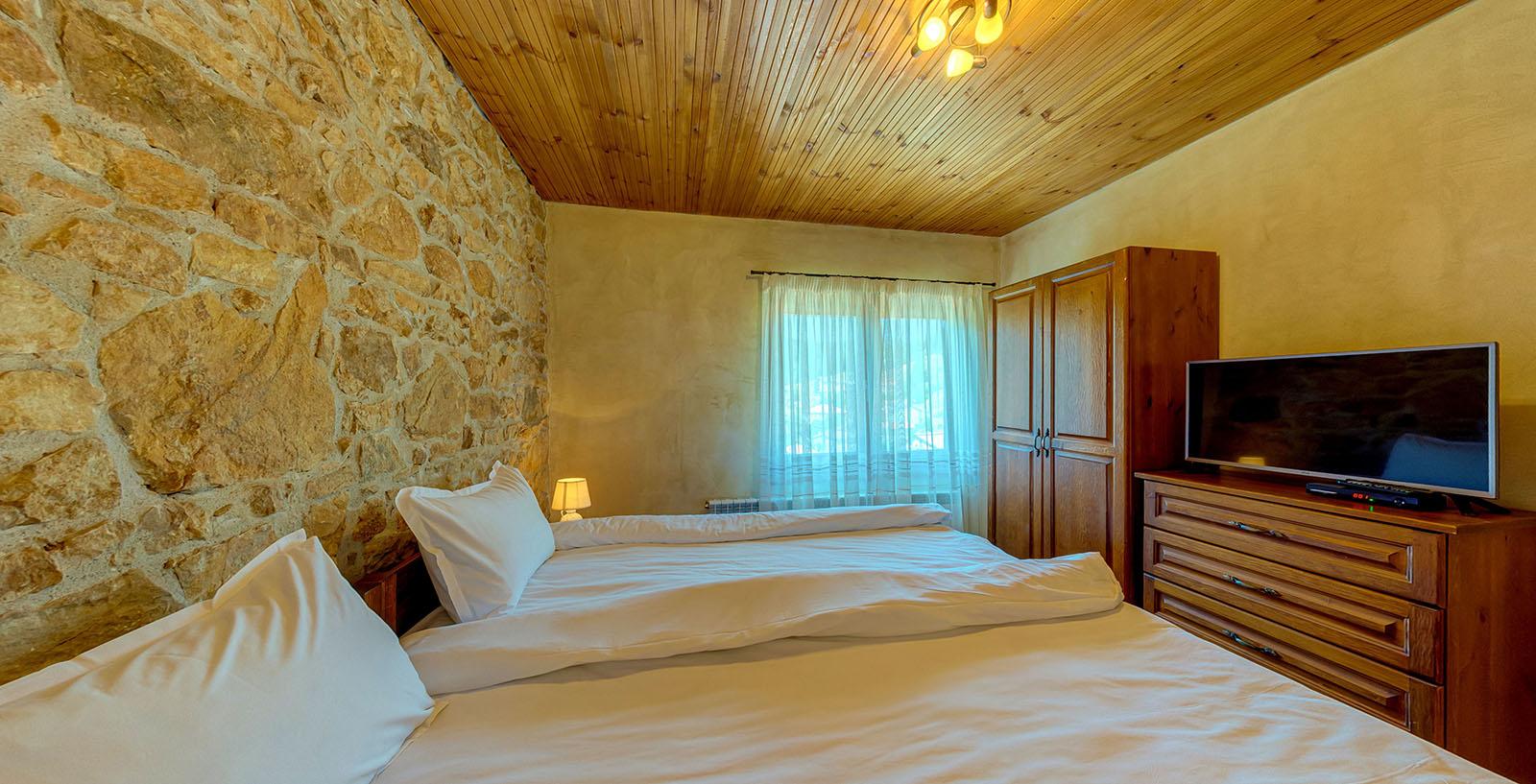 Stone and wood details in the guest house