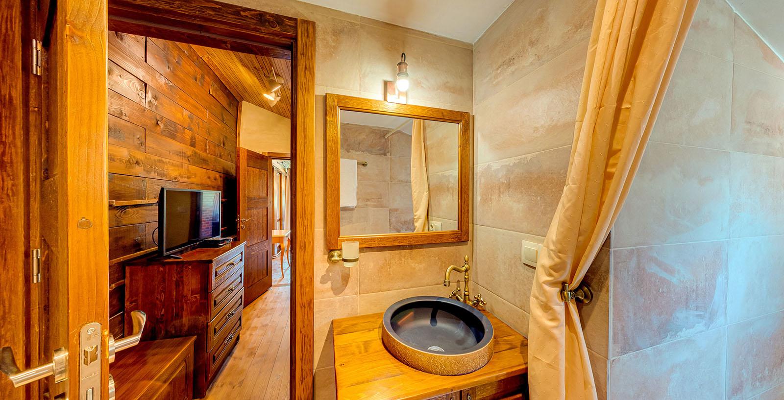 Stone and wood details in the guest house