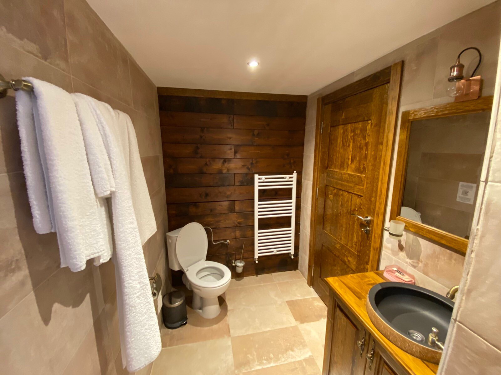 Stone and wood details in the guest house